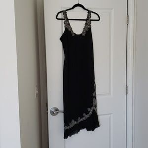Nicole Miller asymmetrical silk black/floral trim dress
